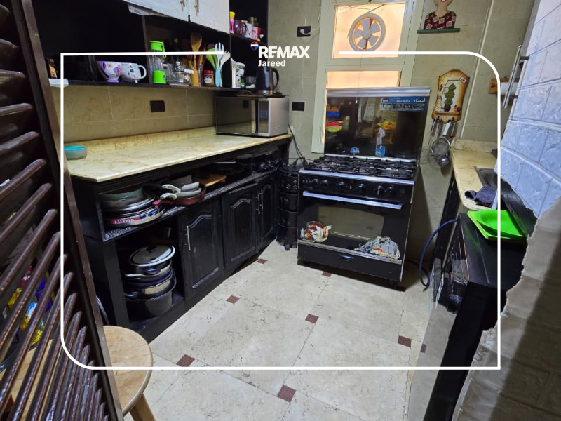Apartment with Private Garden for sale – 10th District, Sheikh Zayed