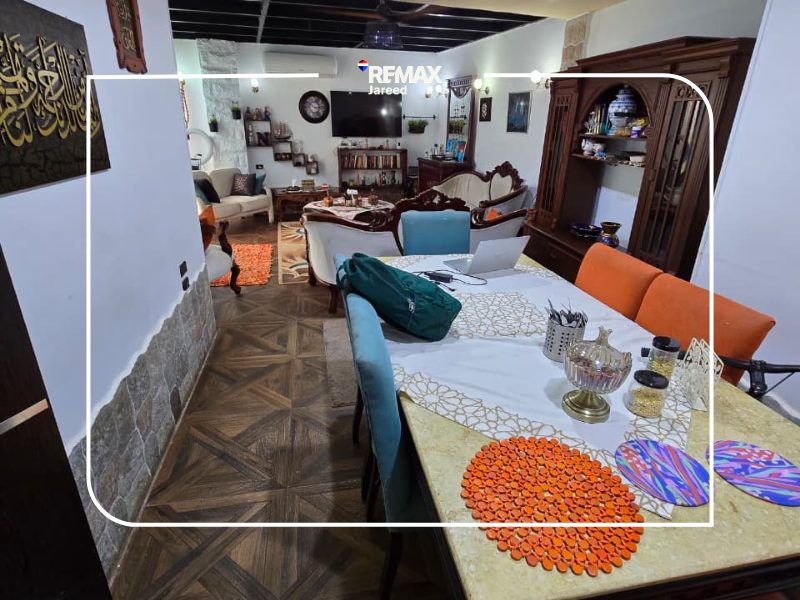 Apartment with Private Garden for sale – 10th District, Sheikh Zayed