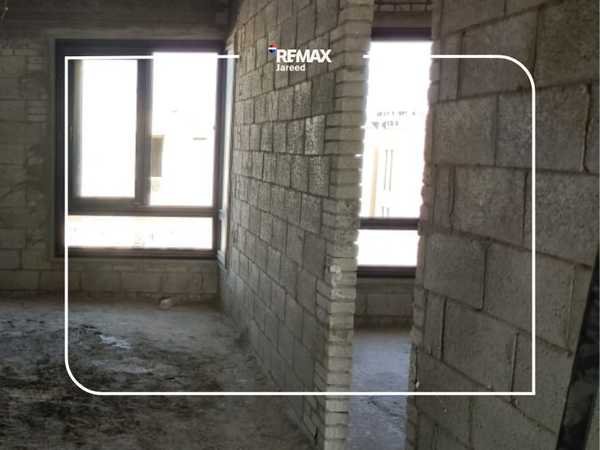 Corner Townhouse in Badya Palm Hills – garden view
